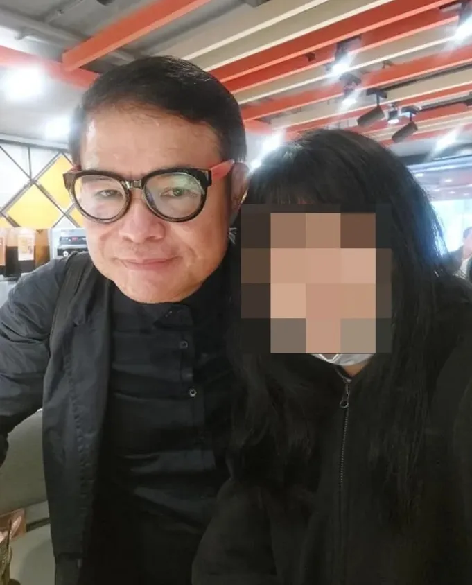 邱國隆自盡前與女兒訣別。翻攝邱國隆臉書