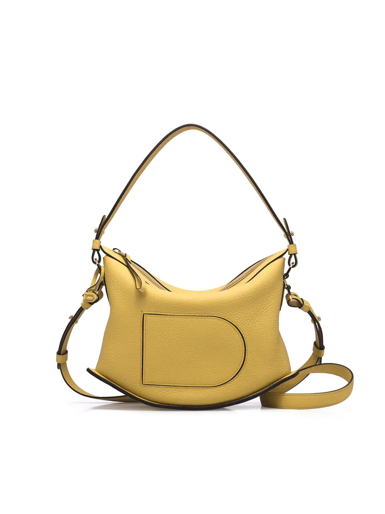 Pin Swing梔子黃Taurillon Soft小牛皮手袋，9萬6300元。品牌提供