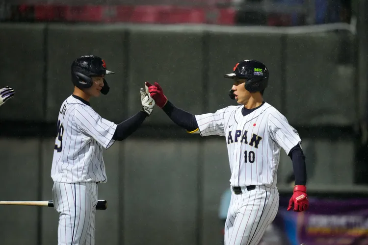 日本丸山壯史在U23冠軍戰轟出致勝3分砲。  中華棒協提供