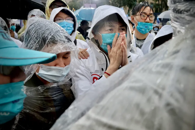 雨勢驚人，但不減與會者熱情。林林攝