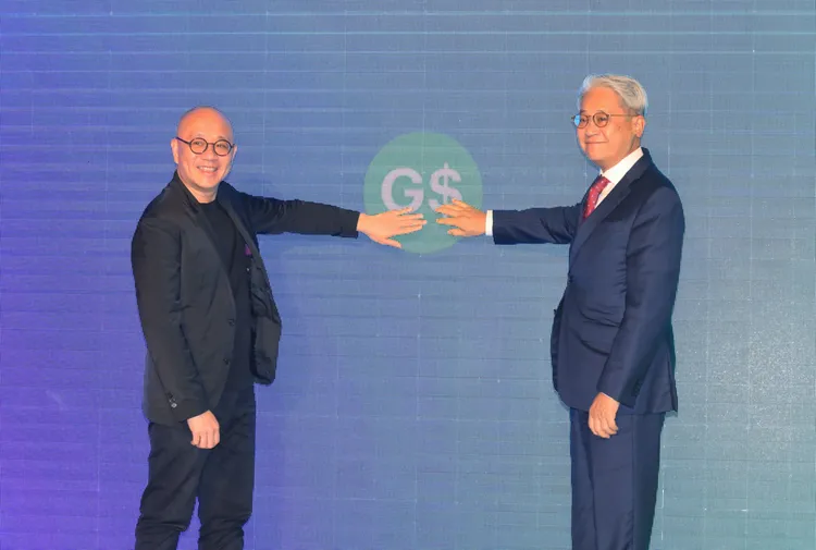 台新金董事長吳東亮(右)與Gogoro創辦人陸學森(左)。