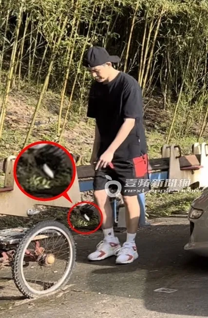 敖犬將菸蒂丟到地上，並用腳踩熄，亂丟菸蒂做出不良示範。特勤中心攝