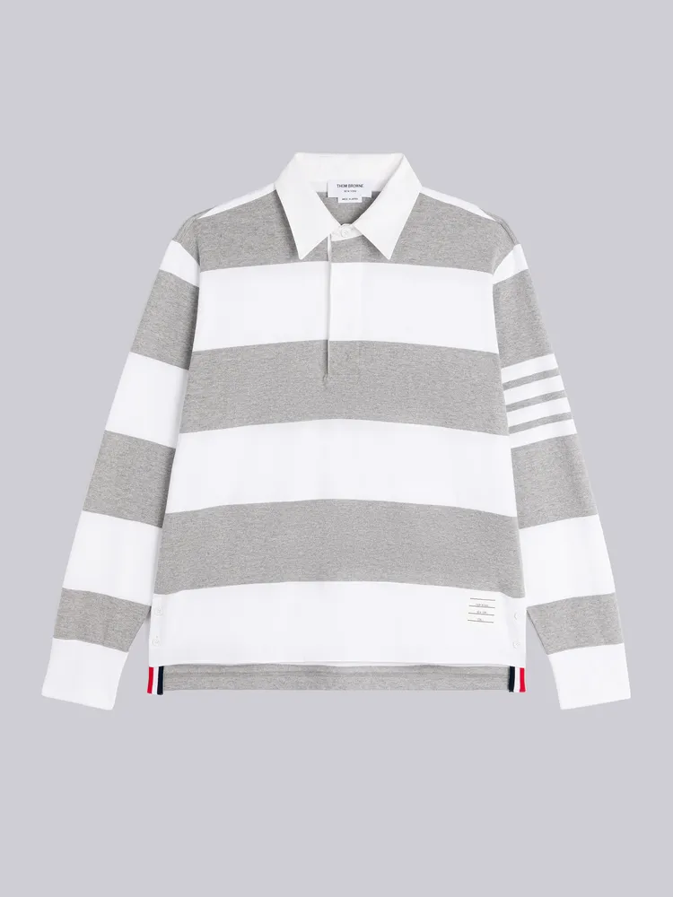 灰白條紋4-Bar Polo衫，2萬3500元。品牌提供