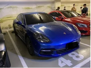 J董家中查獲的保時捷跑車。讀者提供