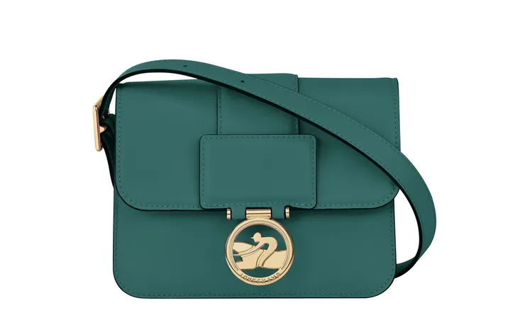 Box-Trot系列柏綠色小型款手提斜背包，2萬1900元。品牌提供