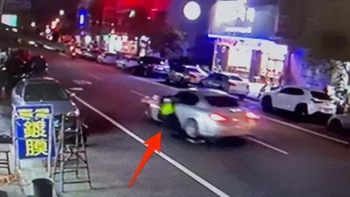 驚悚畫面！南投警抓違停　遭駕車拖行50公尺2傷