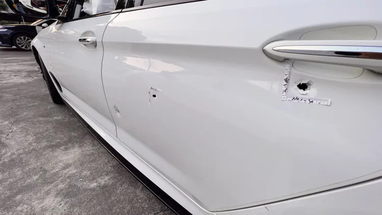 BMW中4槍，駕駛侯男傷重送醫。侯昌騰攝