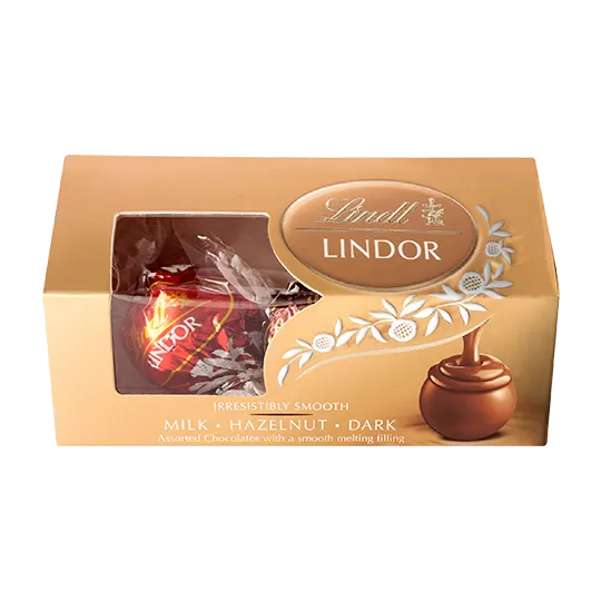 瑞士蓮夾餡綜合巧克力(3入)，售價49元，任選3件贈星形鐵盒。業者提供