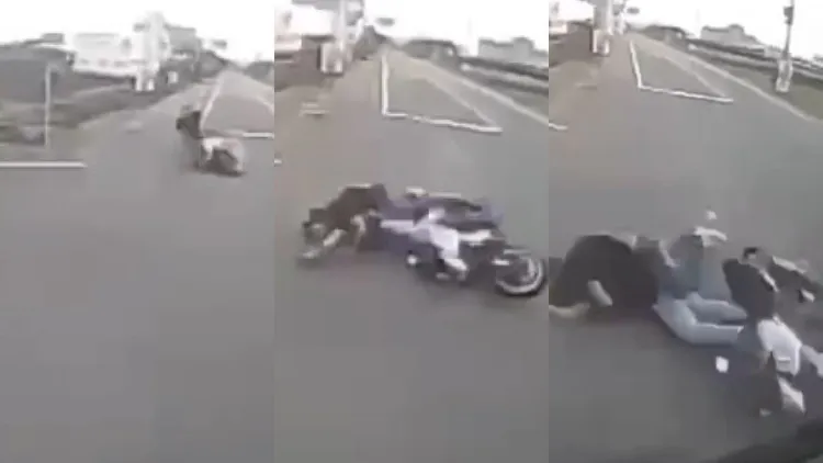 貨車行車紀錄器拍下重機摔車滑入車底瞬間。民眾提供