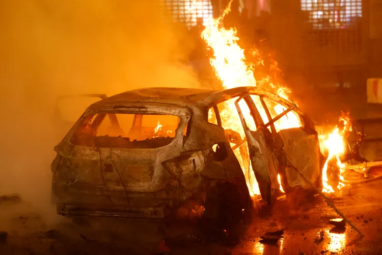 比利時在卡達世界盃爆冷輸給摩洛哥後，有球迷在布魯塞爾市中心大肆破壞。路透社