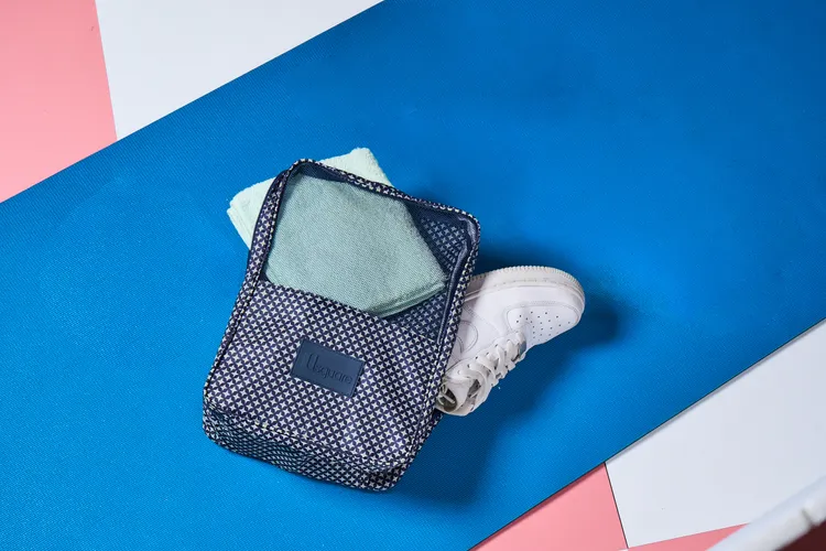 Q卡卡友11/18起單筆消費滿1499元可兌換好Q旅行鞋袋，限量3000個。業者提供