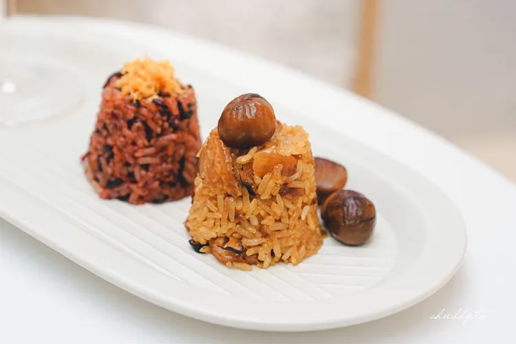 套餐中可嘗到干貝紅麴、堅果臘肉、黑松露3款口味的油飯。業者提供