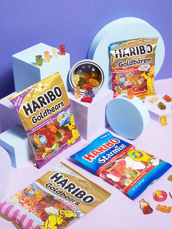 哈瑞寶百年限定款與「哈瑞寶明星總動員Q軟糖」(藍色包裝)。業者提供