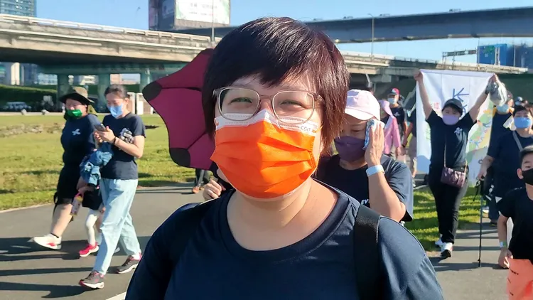 第一次參加健走活動的李小姐(41歲)表示這個活動很有意義，除了可以運動外，還可以帶家人朋友一起來走走。黃子騰攝