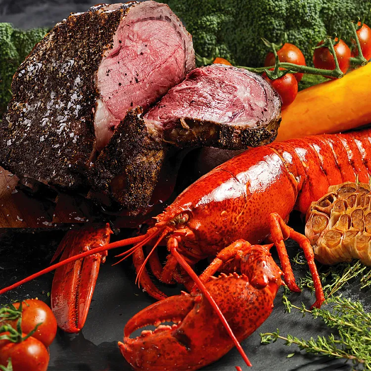 雙人份厚切爐烤肋眼牛排龍蝦套餐。晶華酒店提供