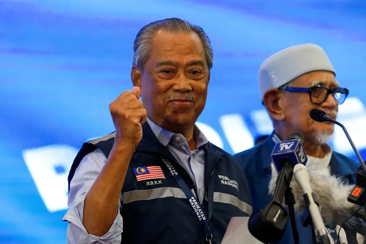 慕尤丁率領的國民聯盟搶下73席。路透社