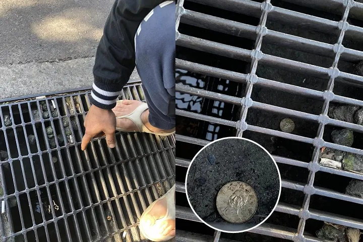 女網友的老公揪她一起搬水溝蓋，為了撿10元。翻攝爆廢公社