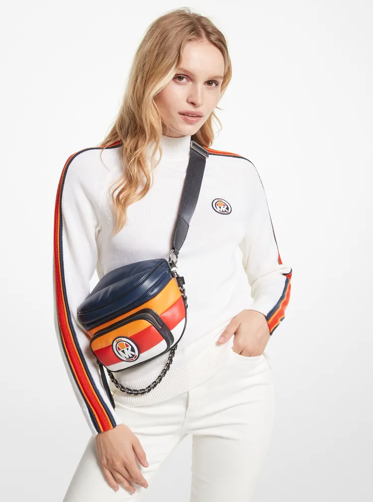 白色立領羊毛針織上衣，1萬6700元。品牌提供