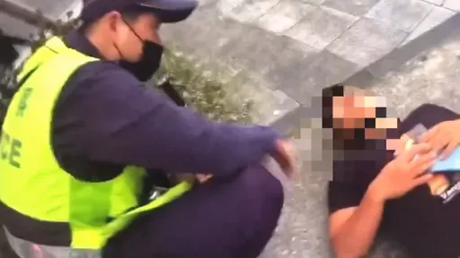 醉男不勝酒力 倒臥路邊!北市警助返家