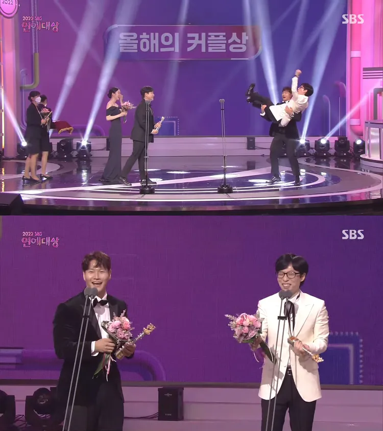 金鐘國上台領獎把劉在錫公主抱起來拋接，2人在《RM》喜歡互相鬥嘴，拿下年度情侶獎。翻攝SBS