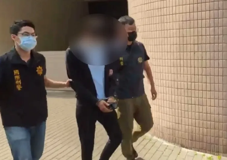 周姓主嫌遭警方逮捕。翻攝畫面