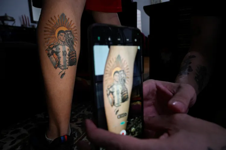 各種不同的梅西紋身圖。路透社