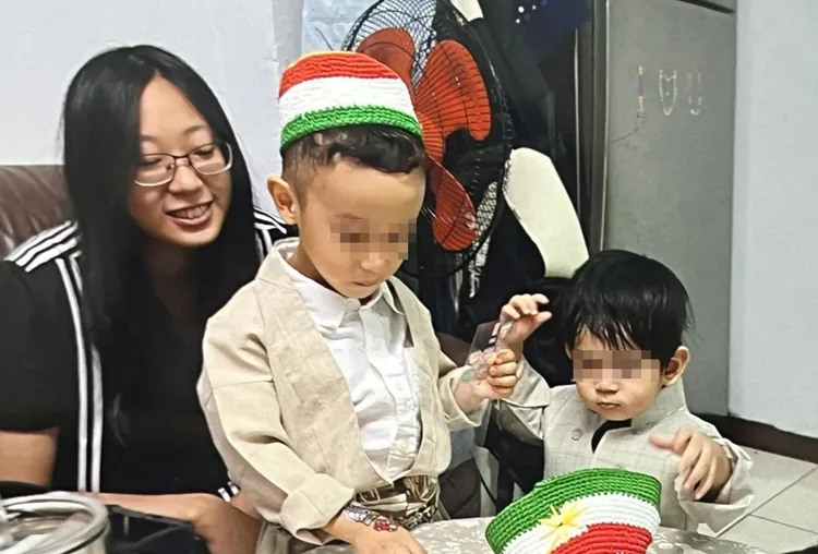 死者李女和一歲的兒子(右)。家屬提供