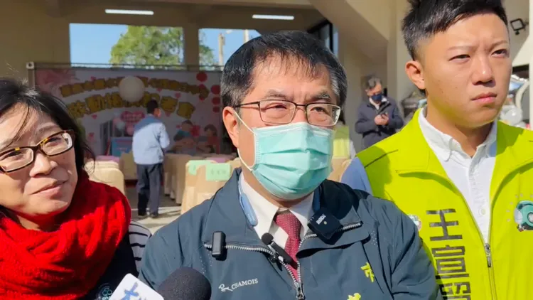 黃偉哲。王志弘攝