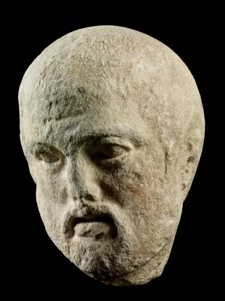 最後一片則是一名蓄鬍男子的頭部。路透社