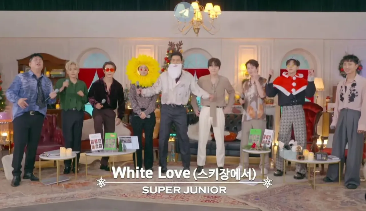 SJ直播中被懲罰戴應景道具,演唱收錄曲《White Love》,藝聲(左四起)頭戴向日葵,始源變身「人間喬巴」。翻攝VLIVE