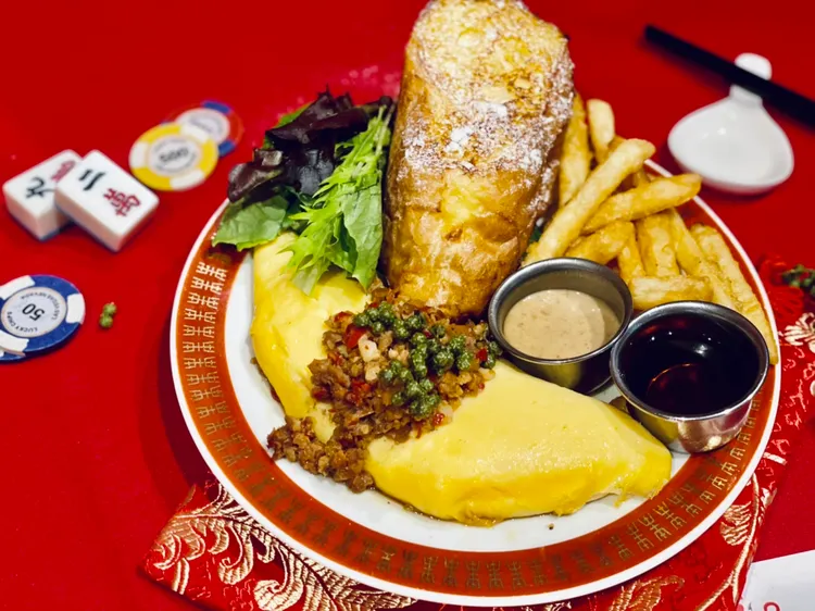 藤椒香麻不辣，帶著鹹香的肉末與蛋香在滑嫩起司烘托下完美融合。曾仲葳攝