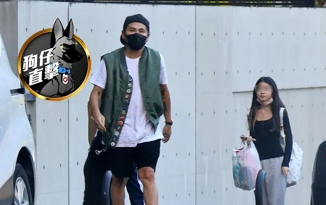 離婚後首度曝光的曹格作勢要找記者理論。特勤中心攝