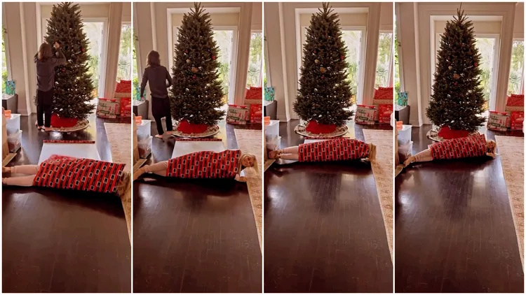 海蒂克隆趁著聖誕節，躺在地上把自己包成禮物，但老公裝沒看到直接離開現場。翻攝heidiklum IG