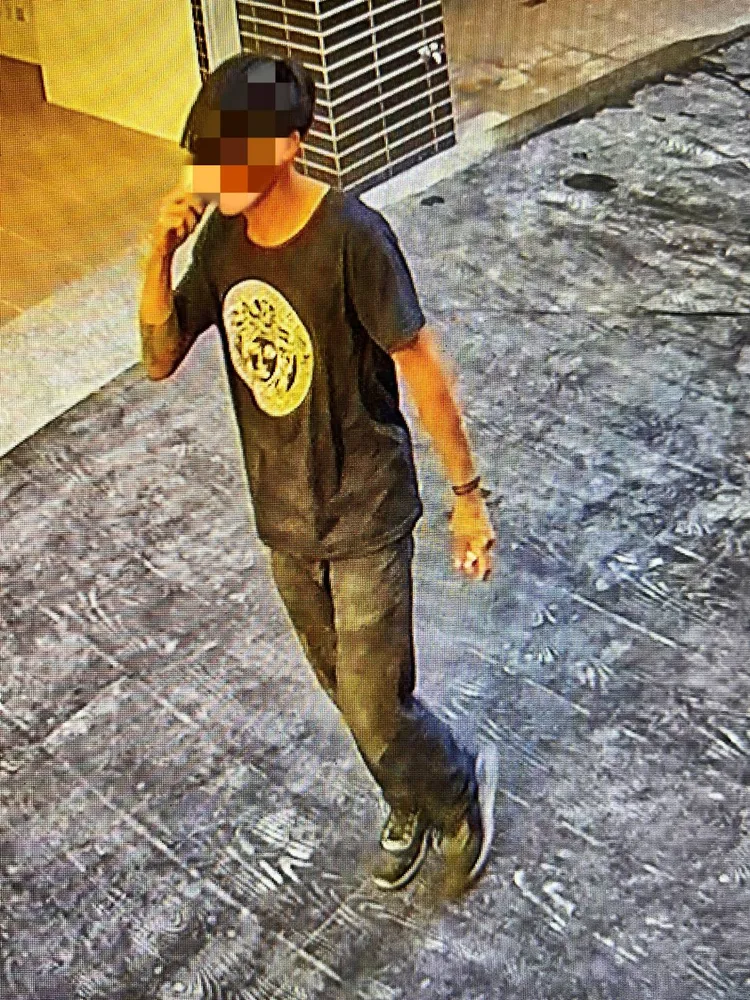 徐嫌得手後離去。讀者提供