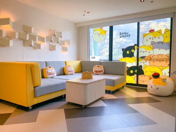 黃阿瑪來趣淘-逗陣套房客廳。趣淘漫旅-台南提供