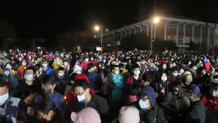 升旗典禮有數千人參加。楊永盛攝