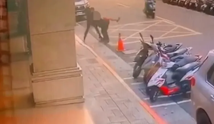 陳男拔腿狂逃，仍被警方制伏逮捕。翻攝畫面