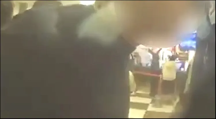 警方抵達，將鬧事的陳男等人上銬逮捕。警方提供