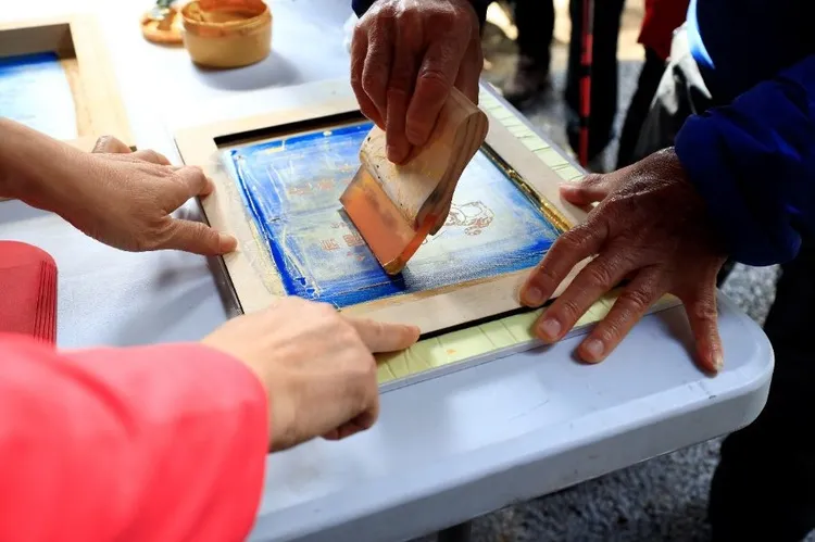 台北茶花展紅包拓印活動。北市工務局提供