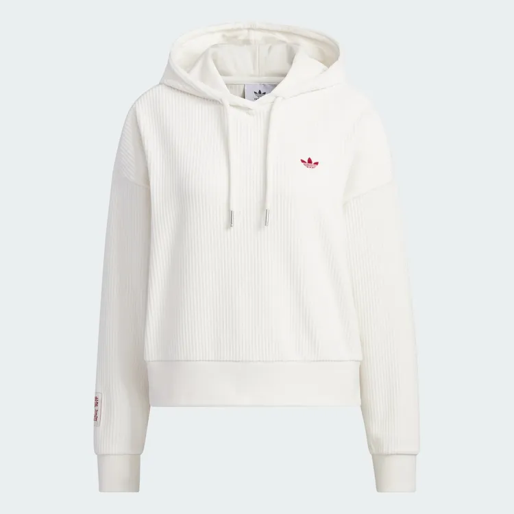 女款米白色短版連帽上衣，3490元。品牌提供