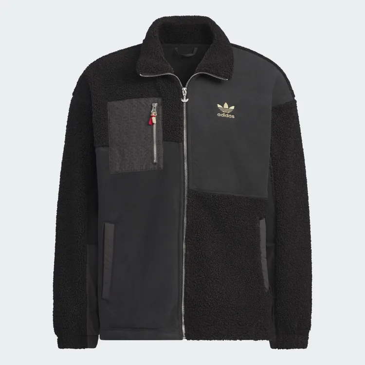 異材質拼接外套胸口的拉鍊以中國結方式呈現，5290元。品牌提供