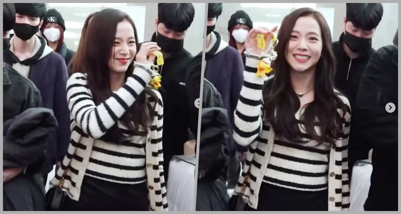 Jisoo亲切接手粉丝送上的挂饰礼物。翻摄reaction_blackpink IG