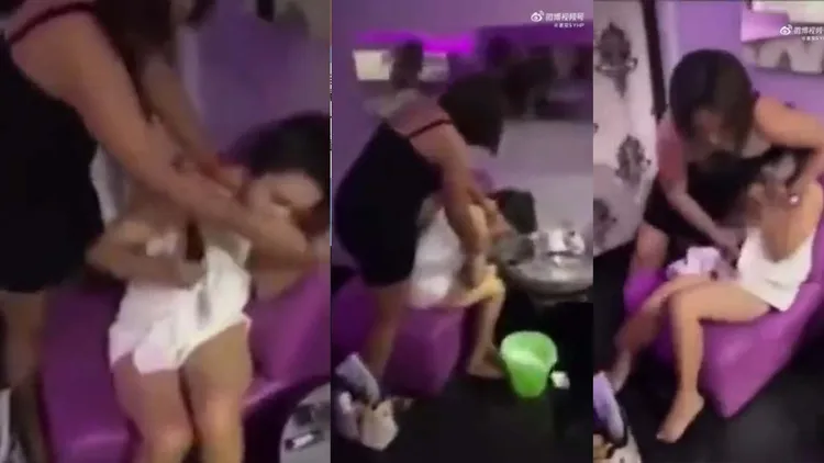 按摩女身上的白浴袍快要被正宮扯掉。引自微博