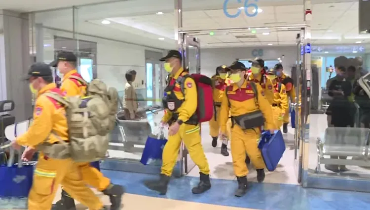 搜救隊員歸來。高鈞麟攝