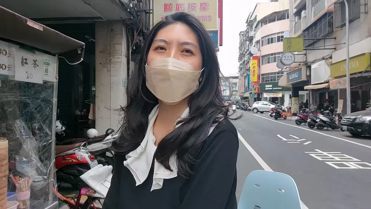 張小姐也說，戴口罩可以保護自己也保護家人。凃建豐攝
