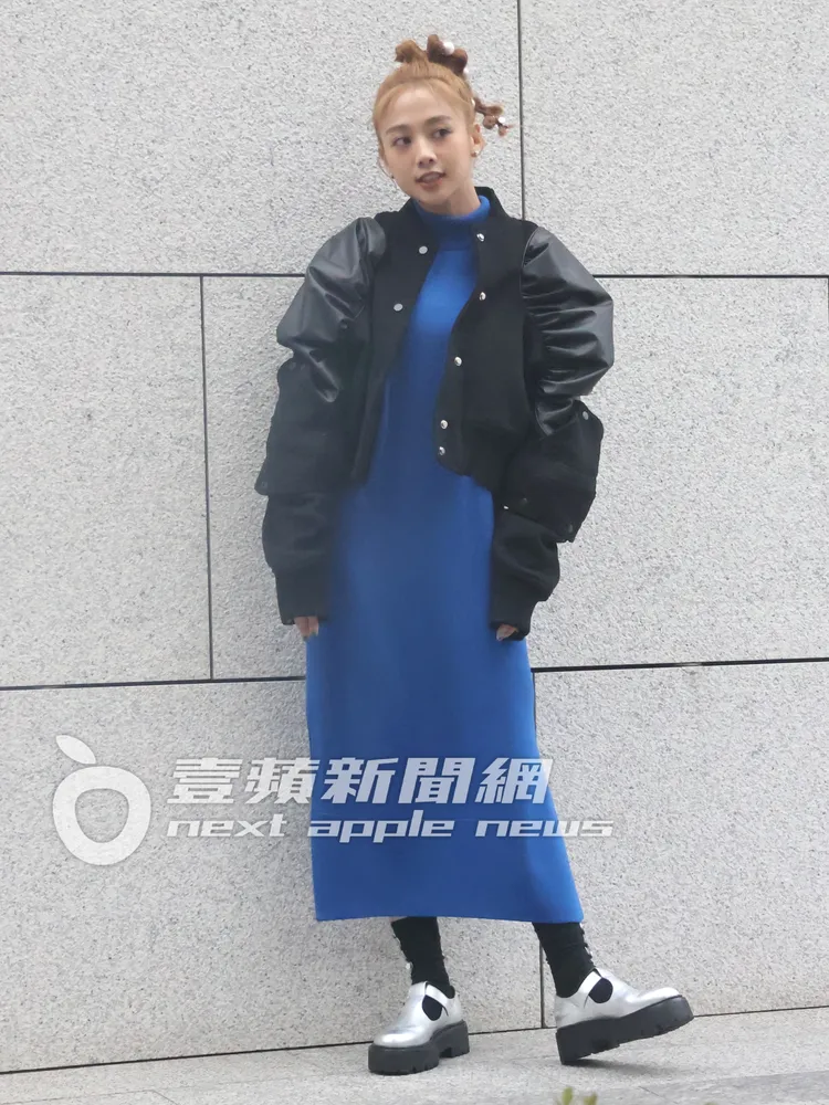 鬼鬼在網美牆前，搔首弄姿表情十分到位。特勤中心攝