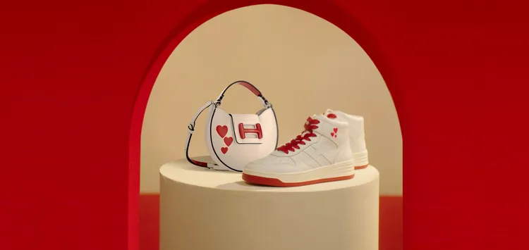 HOGAN H-Bag愛心圖騰迷你圓包（左）2萬6800元、H630系列愛心圖騰高筒休閒鞋2萬3300元。品牌提供