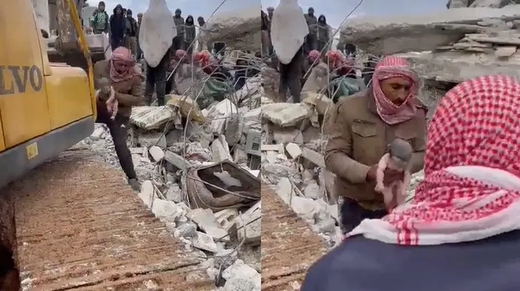 剛出生的嬰兒，被抱離震災現場。翻攝推特@Talhaofficial01