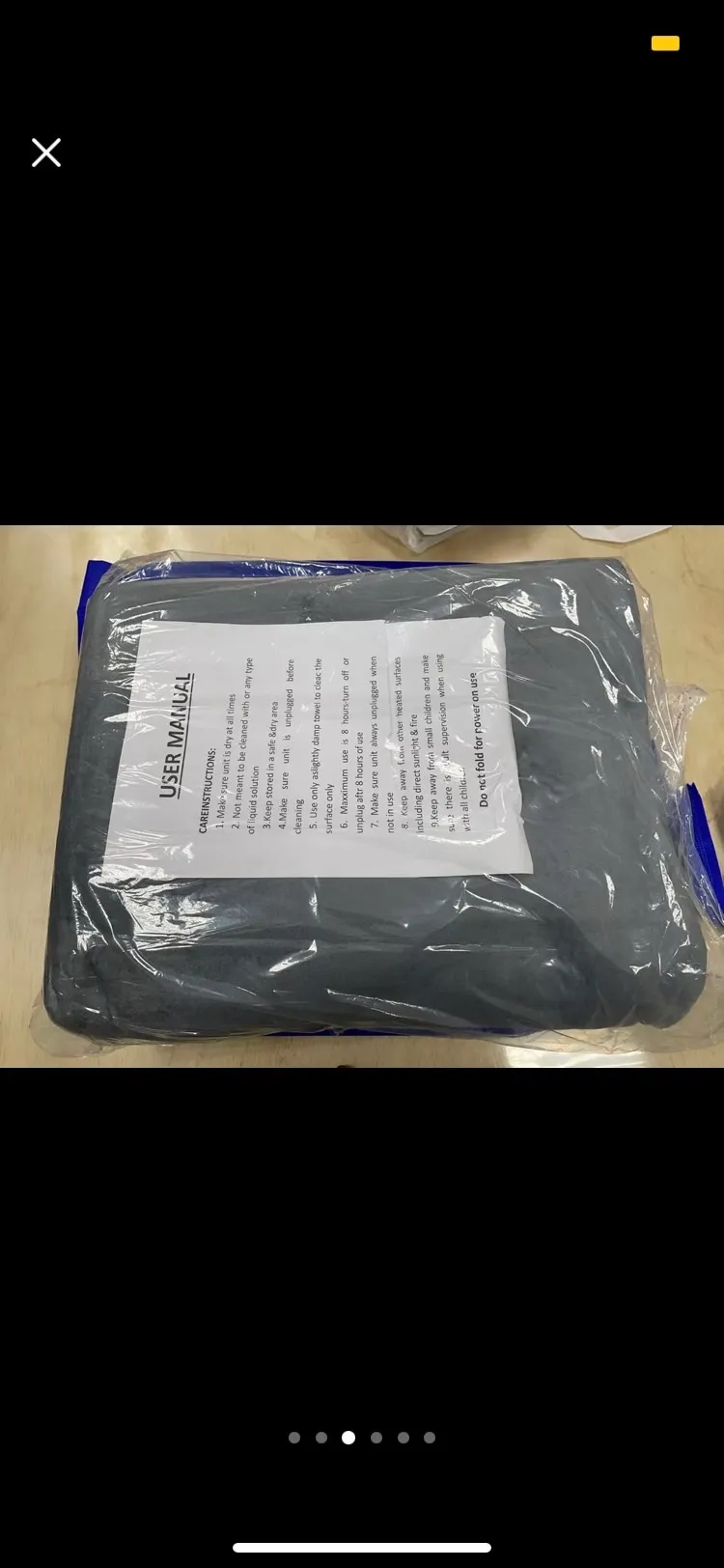 電熱毯到貨後包裝簡單，內容僅有一張英文說明書。民眾提供