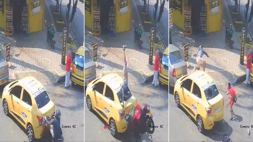 驚悚影片|小黃轉角違停修車 騎士追撞「翻滾飛越計程車」慘摔負傷